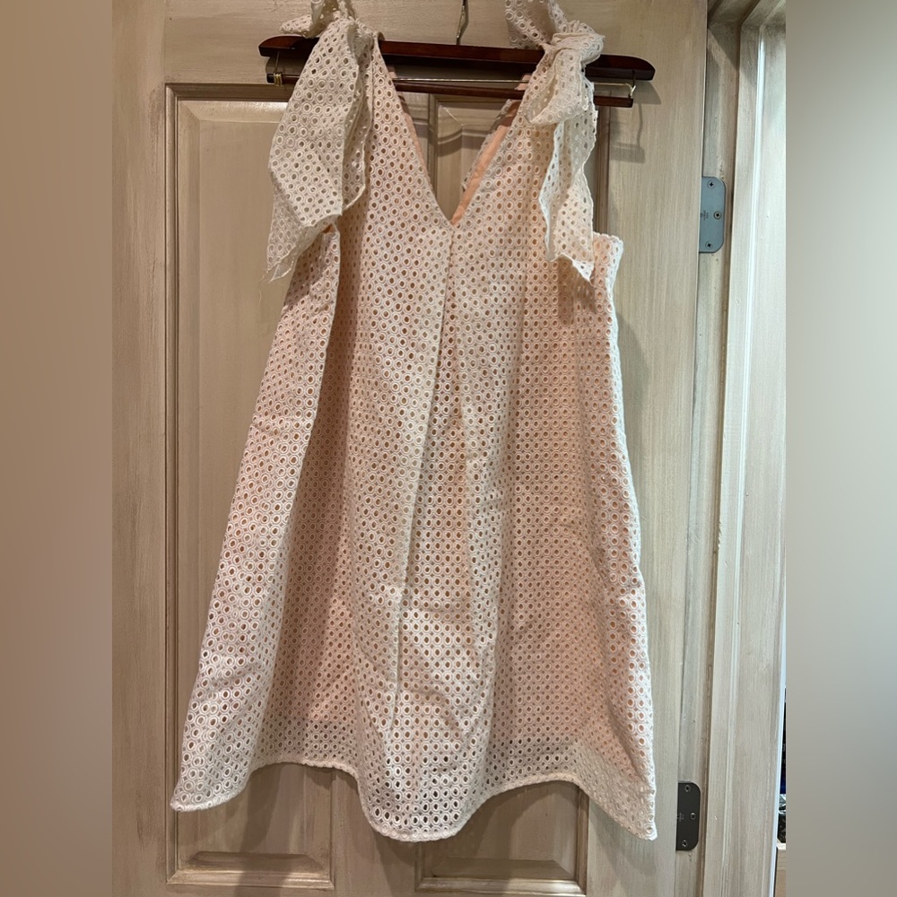 Light pink and crème tie strap babydoll dress